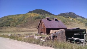 farmhouse with mountains