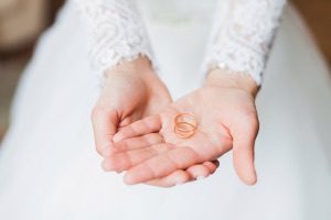 bride with wedding rings
